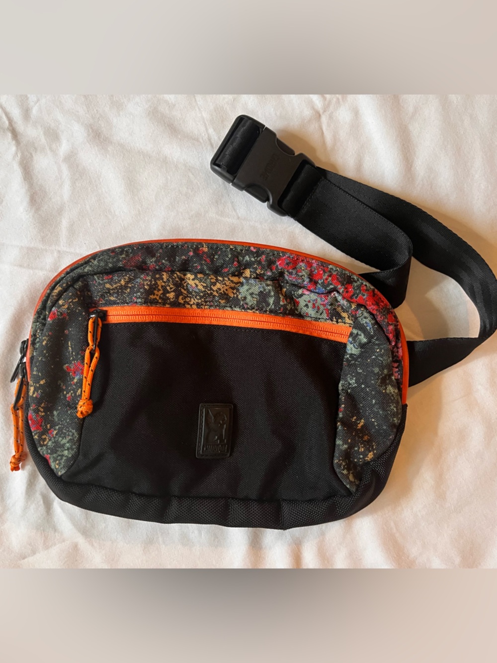 Black Crossbody Bag with Orange Trim and Multicolor Accent